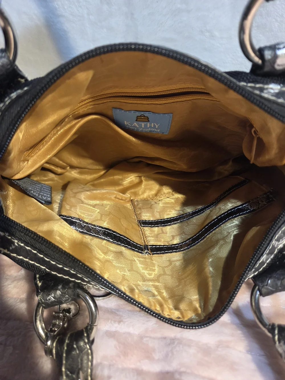 Kathy Van Zeeland Black Women's Satchel Handbag with Metallic Trim